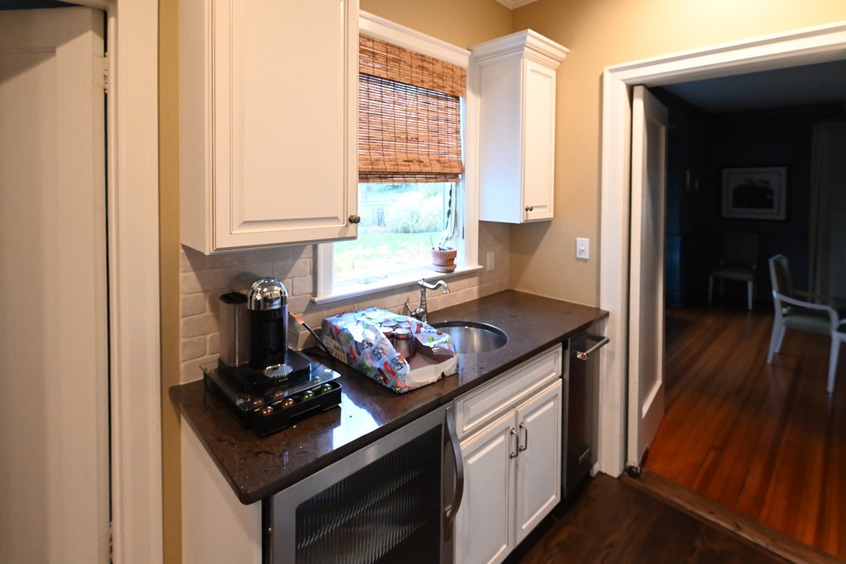 The Whitby traditional distressed white wet bar with beverage center and ice maker