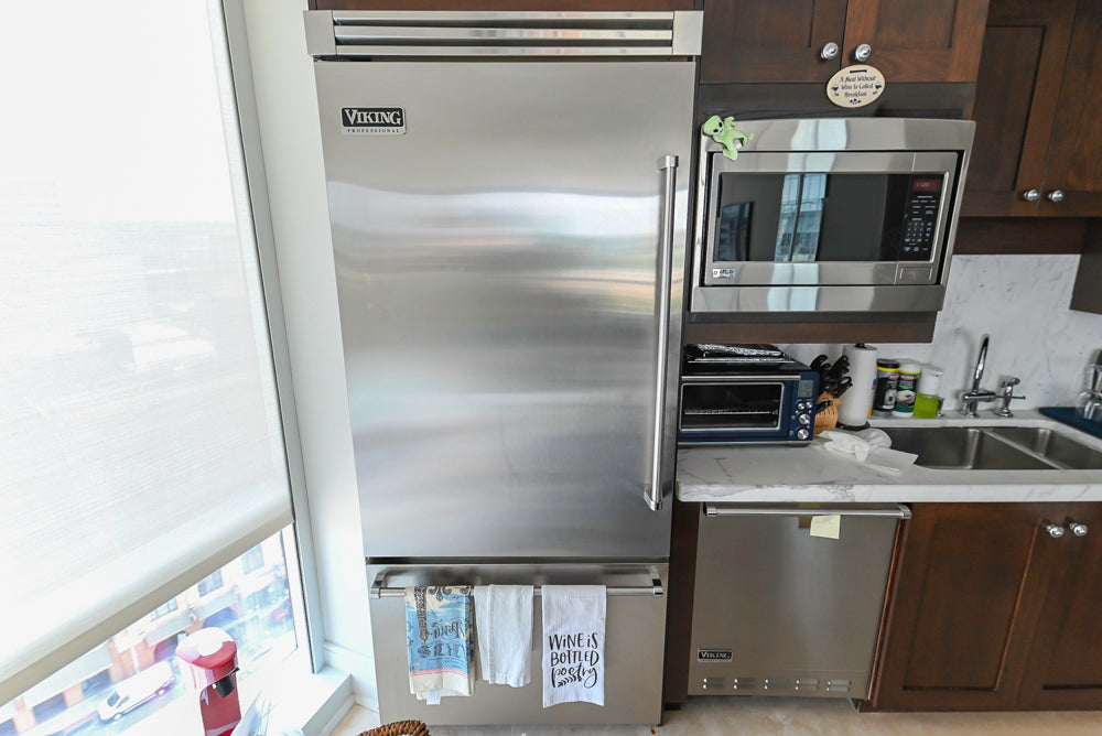 Dark Wooden Traditional Kitchen with Marble Island and Viking Appliance Package
