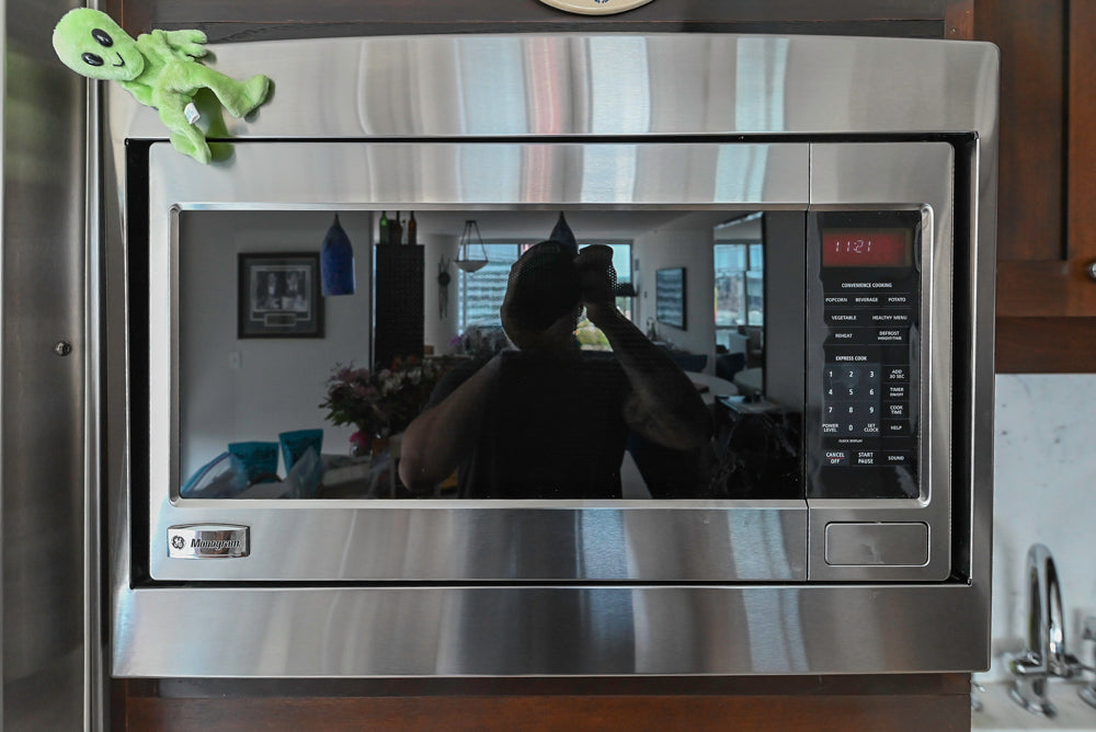 Dark Wooden Traditional Kitchen with Marble Island and Viking Appliance Package