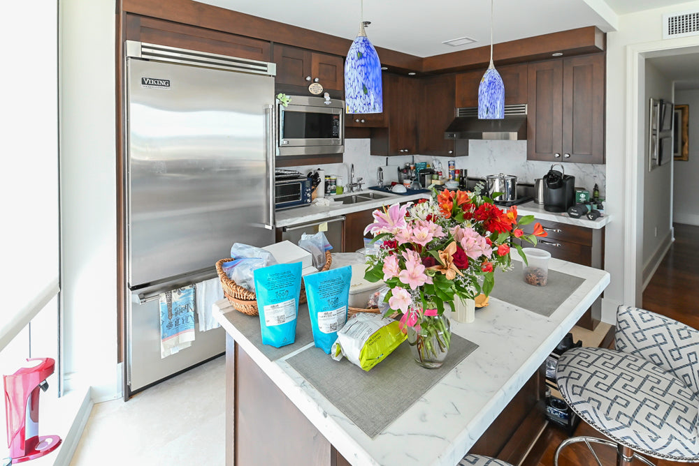 Dark Wooden Traditional Kitchen with Marble Island and Viking Appliance Package