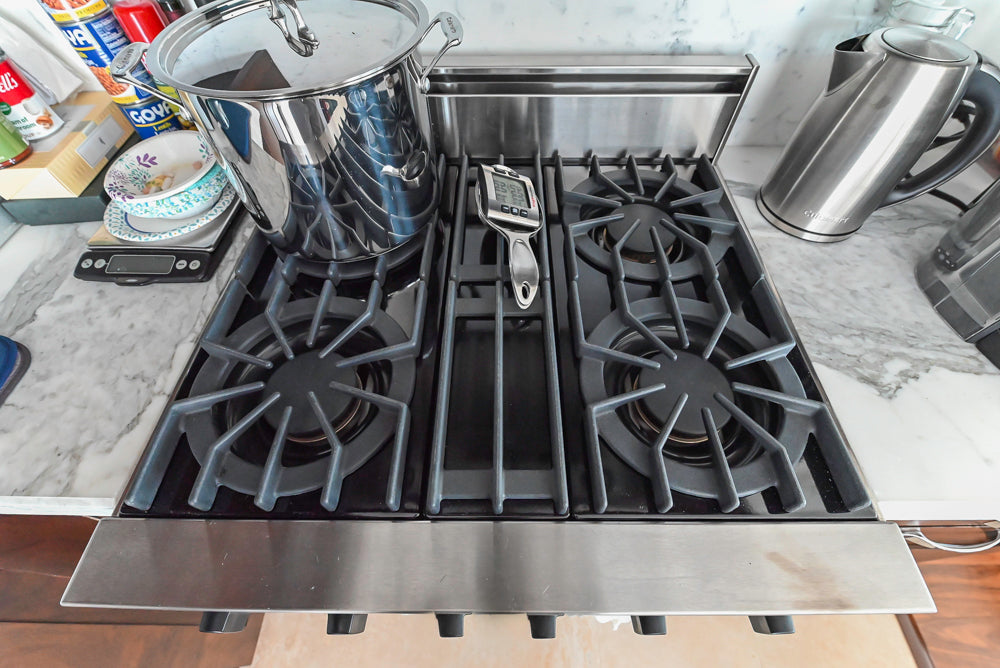 Dark Wooden Traditional Kitchen with Marble Island and Viking Appliance Package