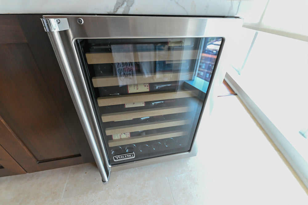 Dark Wooden Traditional Kitchen with Marble Island and Viking Appliance Package