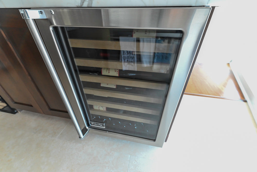 Dark Wooden Traditional Kitchen with Marble Island and Viking Appliance Package