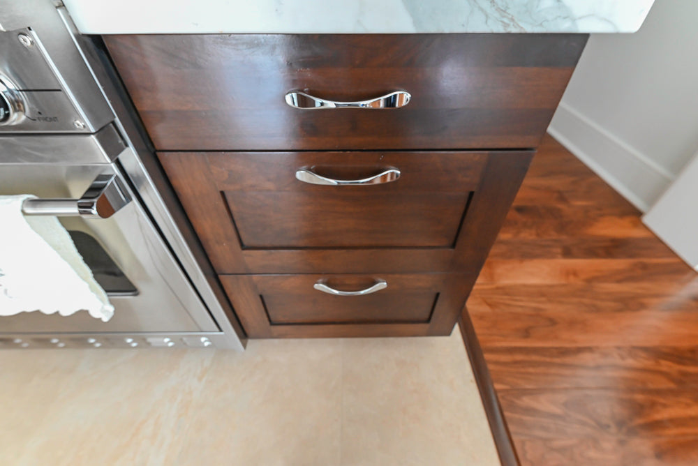 Dark Wooden Traditional Kitchen with Marble Island and Viking Appliance Package
