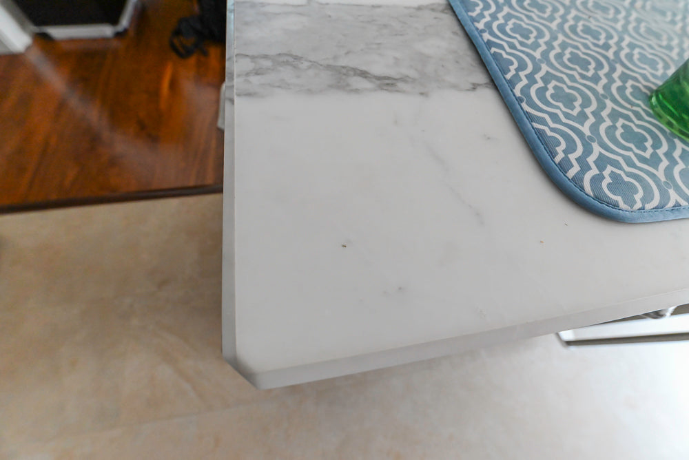 Dark Wooden Traditional Kitchen with Marble Island and Viking Appliance Package