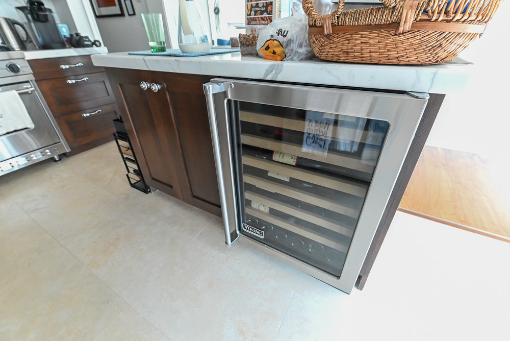Dark Wooden Traditional Kitchen with Marble Island and Viking Appliance Package