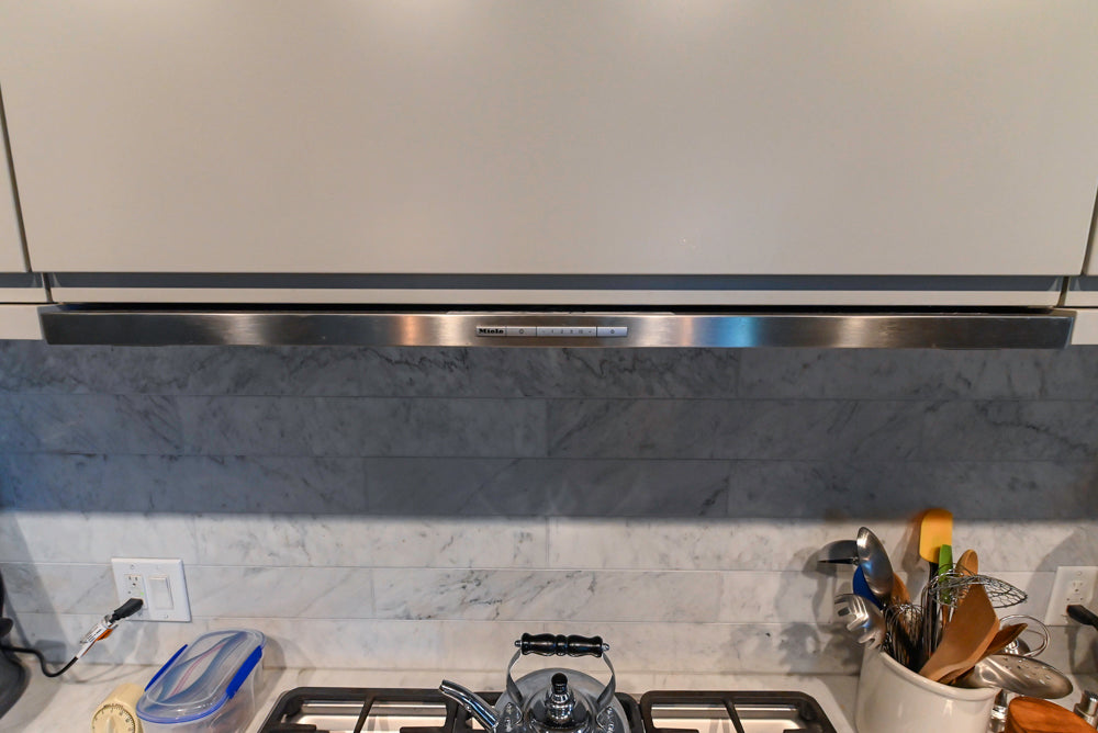 Stevali Stunner: Modern Two-Tone Kitchen with Island and Miele Appliance Package