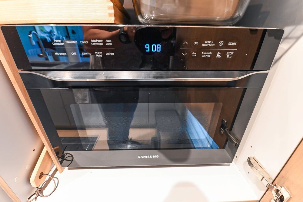 Stevali Stunner: Modern Two-Tone Kitchen with Island and Miele Appliance Package