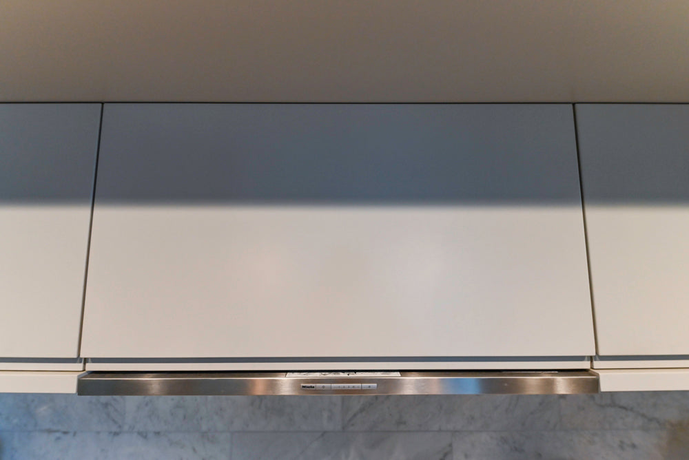 Stevali Stunner: Modern Two-Tone Kitchen with Island and Miele Appliance Package