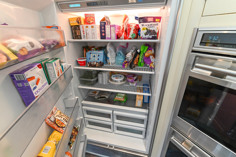 Cronin Cabinets Charm: Traditional White Kitchen with Island & Luxe Appliances