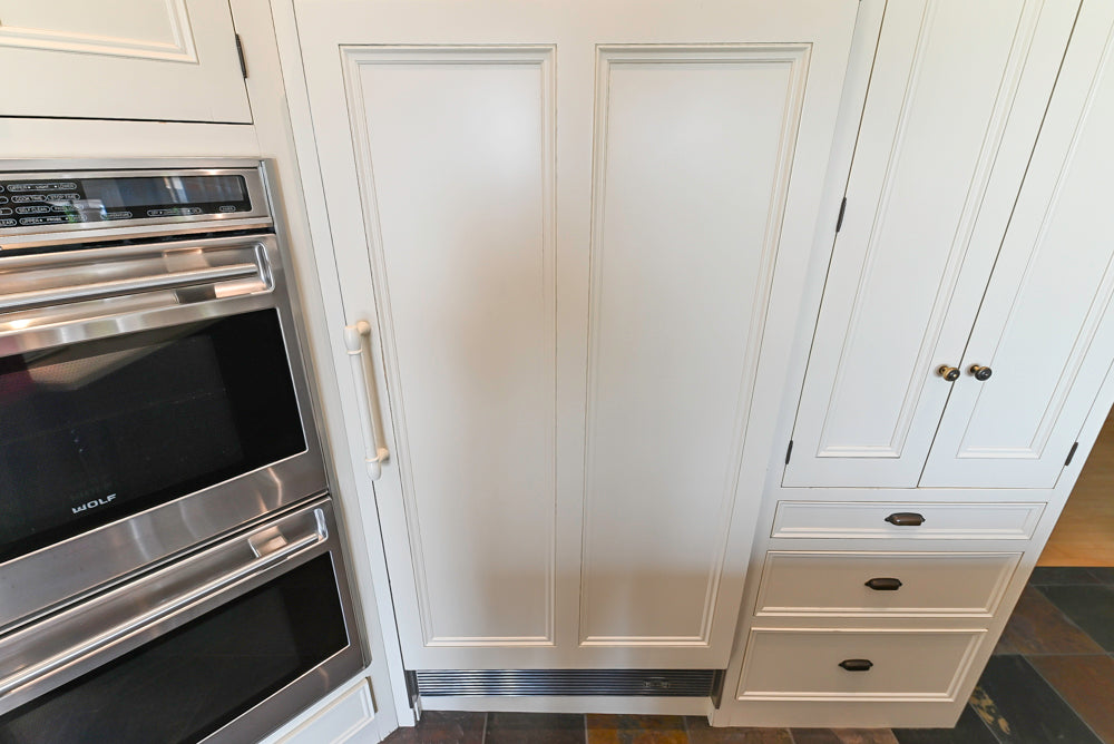 Cronin Cabinets Charm: Traditional White Kitchen with Island & Luxe Appliances