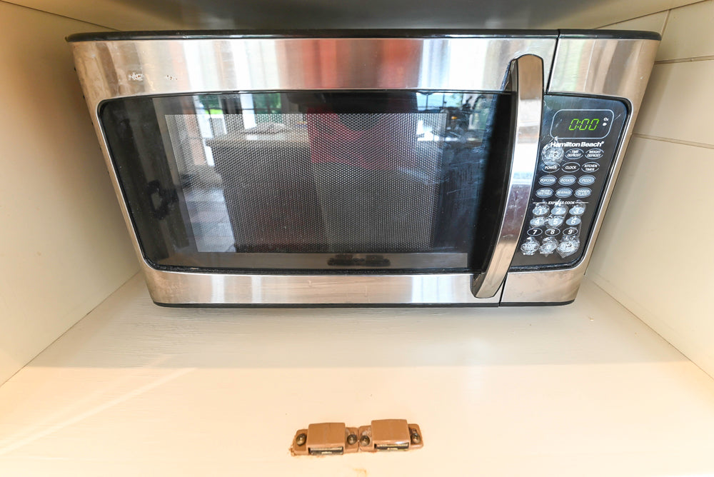 Cronin Cabinets Charm: Traditional White Kitchen with Island & Luxe Appliances