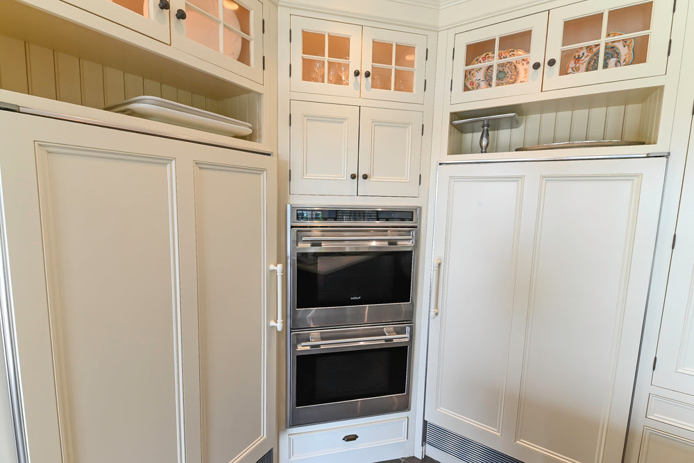 Cronin Cabinets Charm: Traditional White Kitchen with Island & Luxe Appliances
