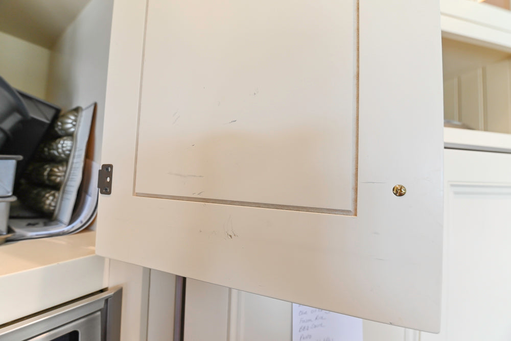 Cronin Cabinets Charm: Traditional White Kitchen with Island & Luxe Appliances