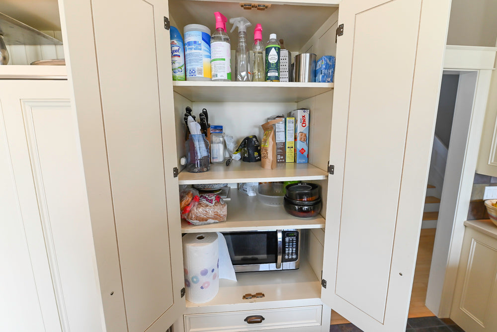Cronin Cabinets Charm: Traditional White Kitchen with Island & Luxe Appliances