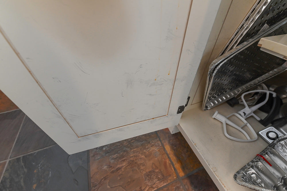 Cronin Cabinets Charm: Traditional White Kitchen with Island & Luxe Appliances