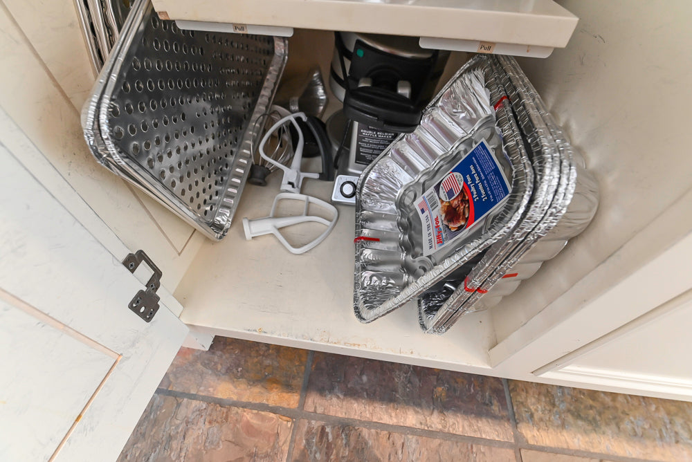 Cronin Cabinets Charm: Traditional White Kitchen with Island & Luxe Appliances