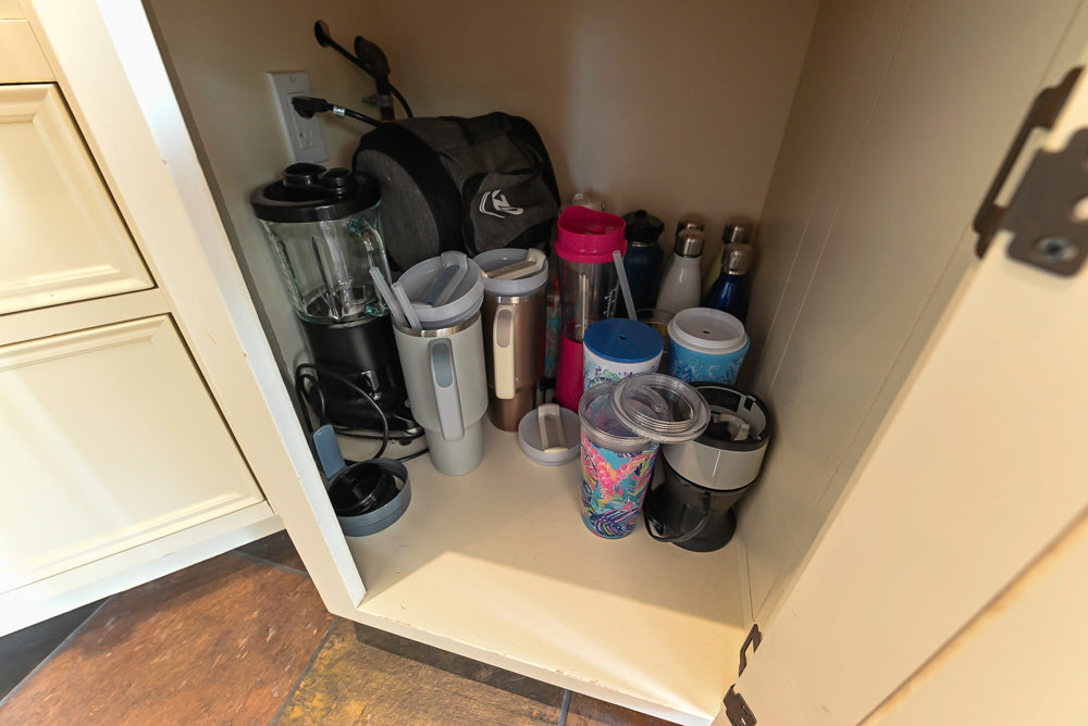 Cronin Cabinets Charm: Traditional White Kitchen with Island & Luxe Appliances