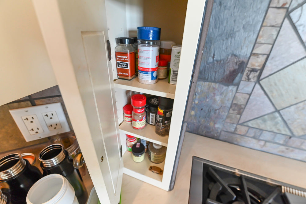 Cronin Cabinets Charm: Traditional White Kitchen with Island & Luxe Appliances
