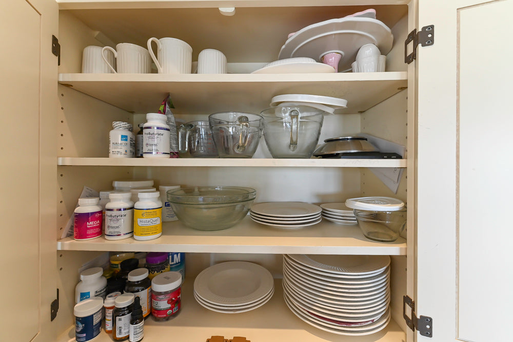 Cronin Cabinets Charm: Traditional White Kitchen with Island & Luxe Appliances