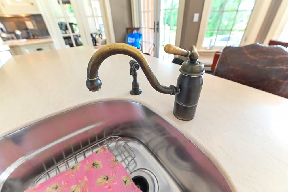 Cronin Cabinets Charm: Traditional White Kitchen with Island & Luxe Appliances