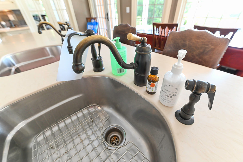 Cronin Cabinets Charm: Traditional White Kitchen with Island & Luxe Appliances