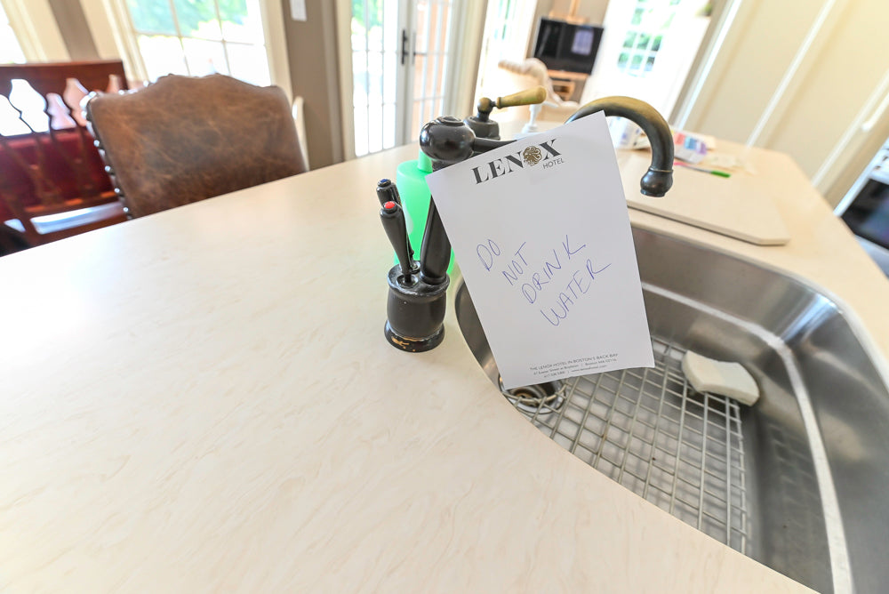 Cronin Cabinets Charm: Traditional White Kitchen with Island & Luxe Appliances