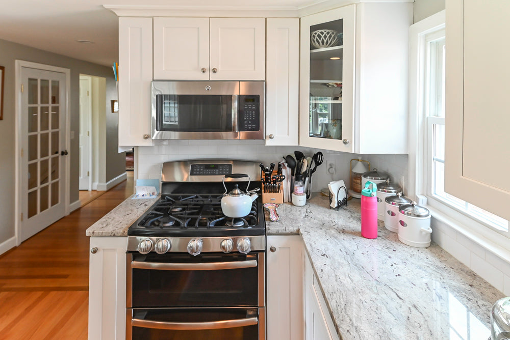 Traditional White Kitchen with Granite Island and Appliances