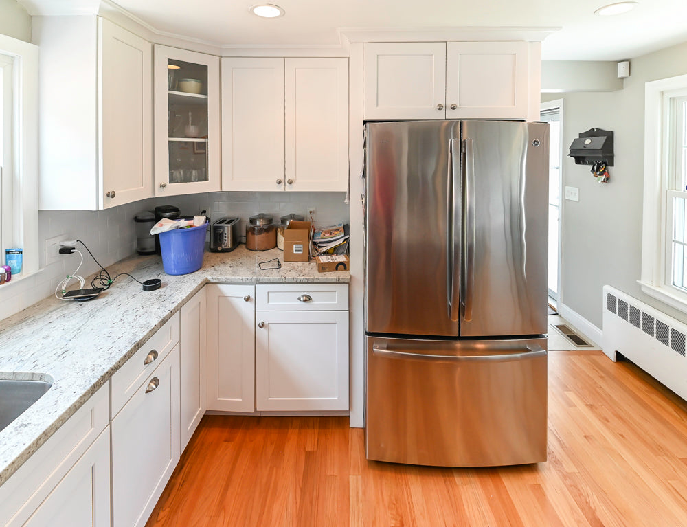 Traditional White Kitchen with Granite Island and Appliances