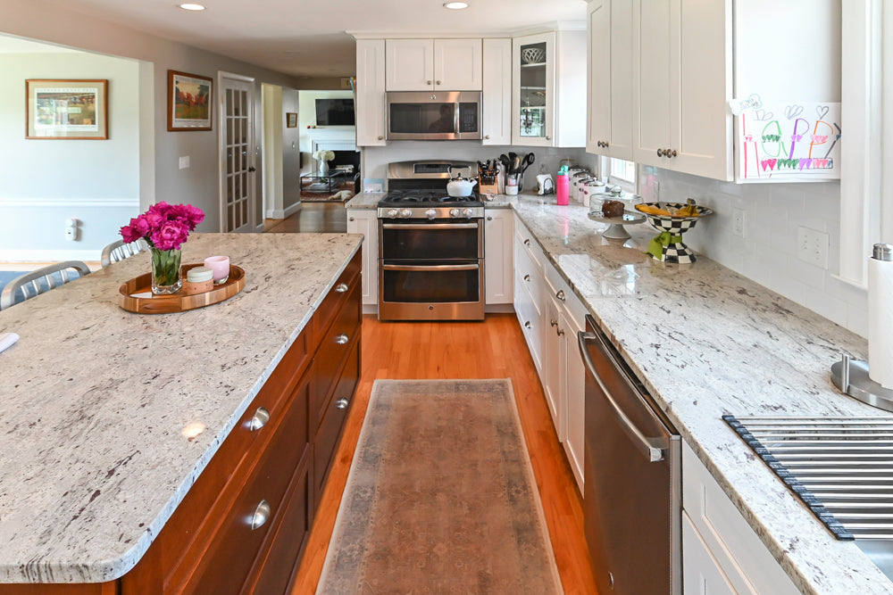 Traditional White Kitchen with Granite Island and Appliances