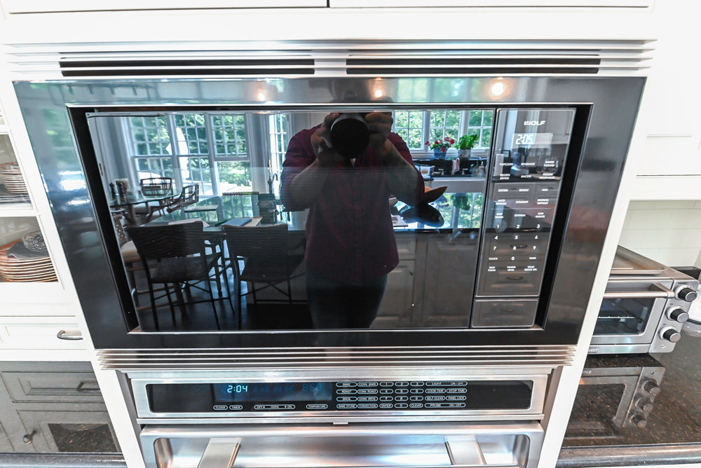 Signature Custom Cabinetry Traditional White Kitchen with Island, Desk Area & Appliances