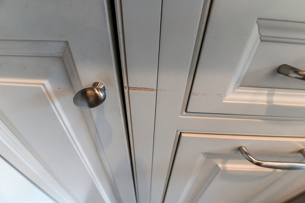 Signature Custom Cabinetry Traditional White Kitchen with Island, Desk Area & Appliances