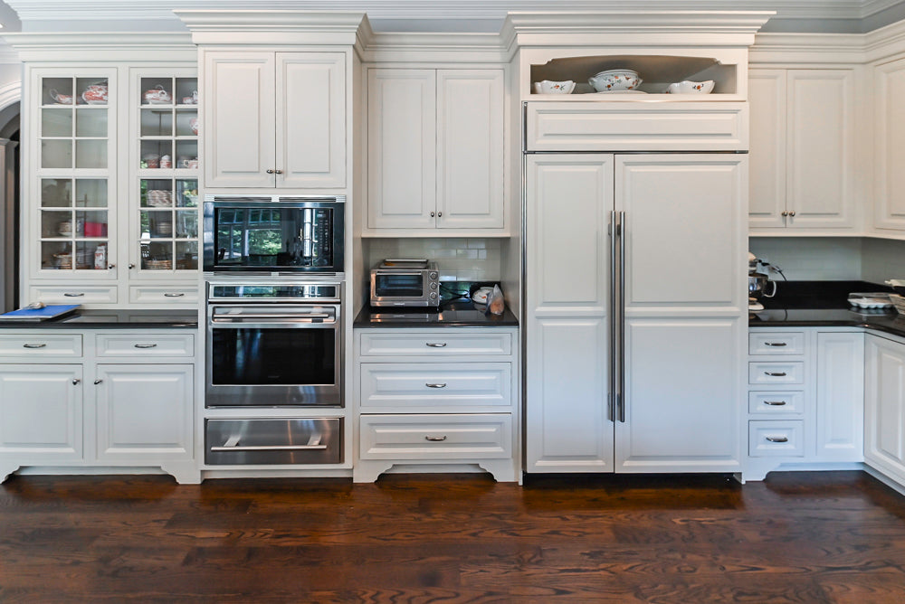 Signature Custom Cabinetry Traditional White Kitchen with Island, Desk Area & Appliances