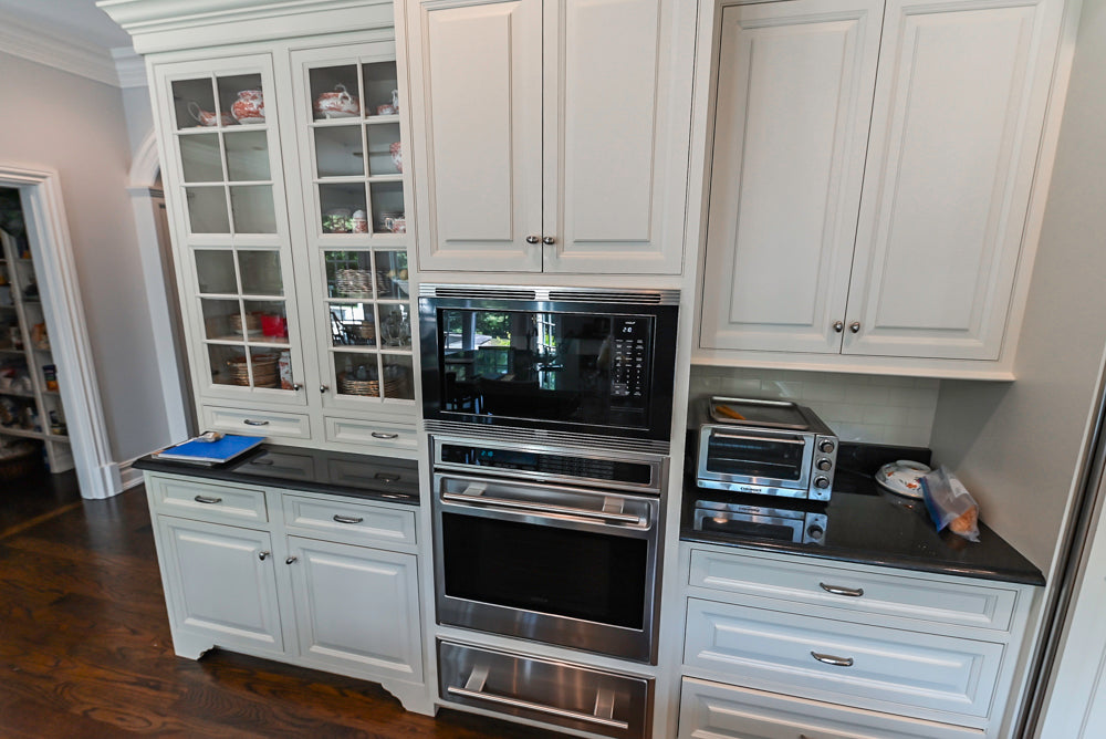 Signature Custom Cabinetry Traditional White Kitchen with Island, Desk Area & Appliances