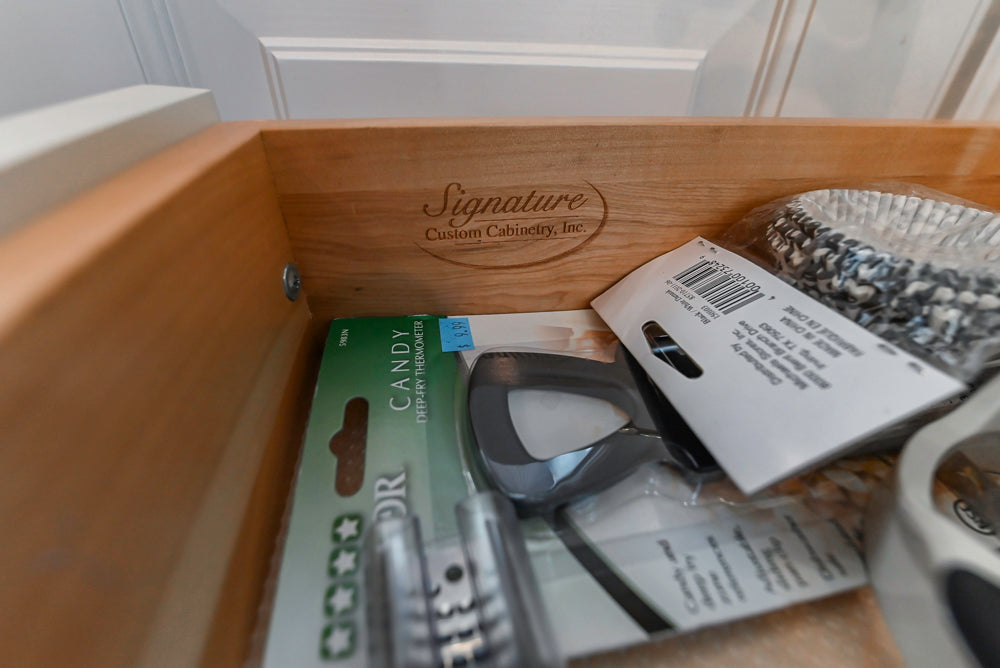 Signature Custom Cabinetry Traditional White Kitchen with Island, Desk Area & Appliances