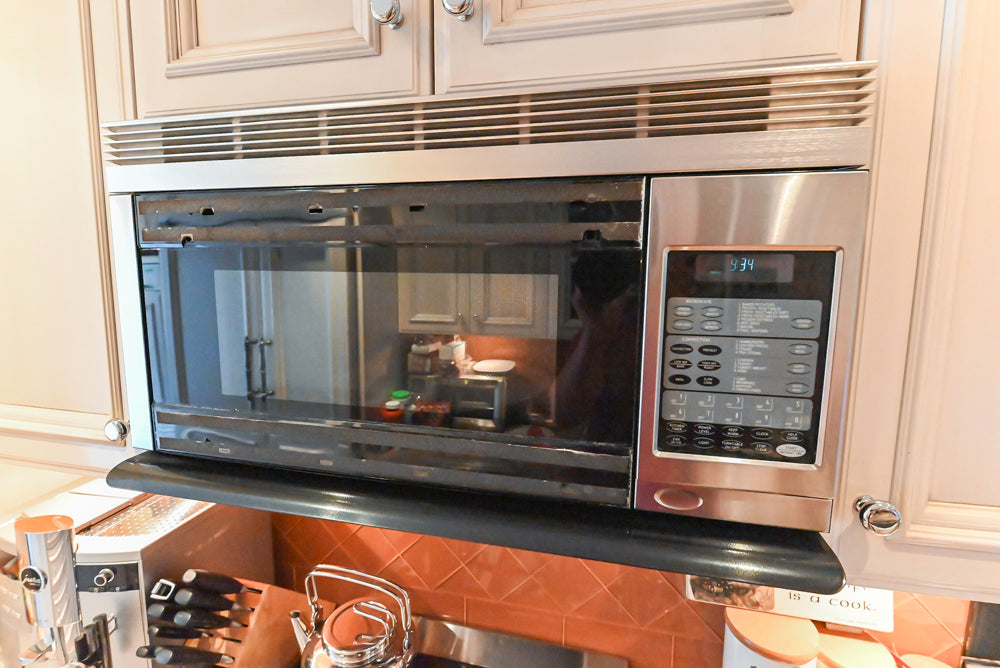 Wood-Mode Wonder: Traditional Light Cream Kitchen with Granite Countertops