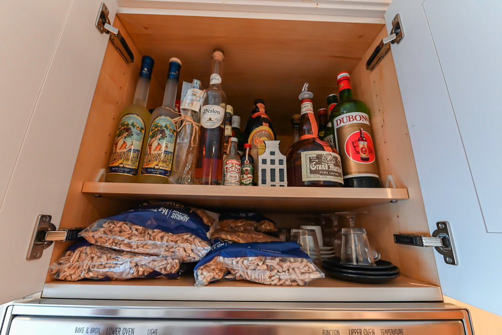 Wood-Mode Wonder: Traditional Light Cream Kitchen with Granite Countertops