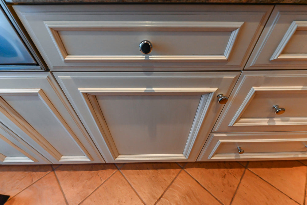 Wood-Mode Wonder: Traditional Light Cream Kitchen with Granite Countertops