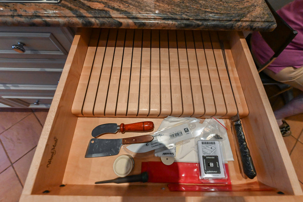 Wood-Mode Wonder: Traditional Light Cream Kitchen with Granite Countertops