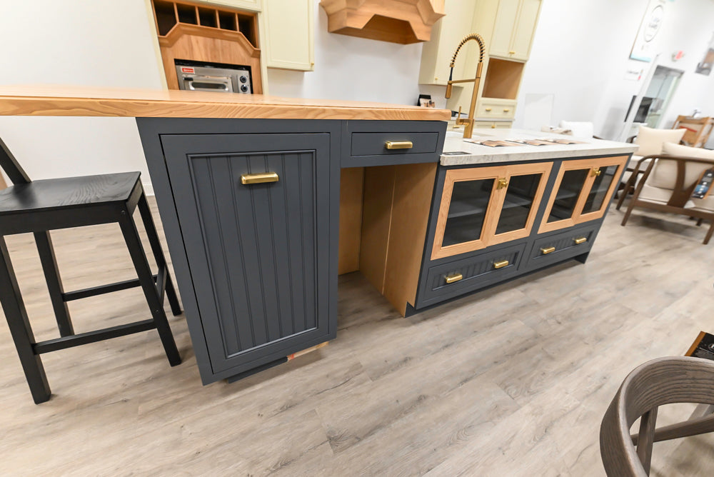 Covered Bridge Two-Tone Traditional Showroom Kitchen with Island and Caesarstone Countertops