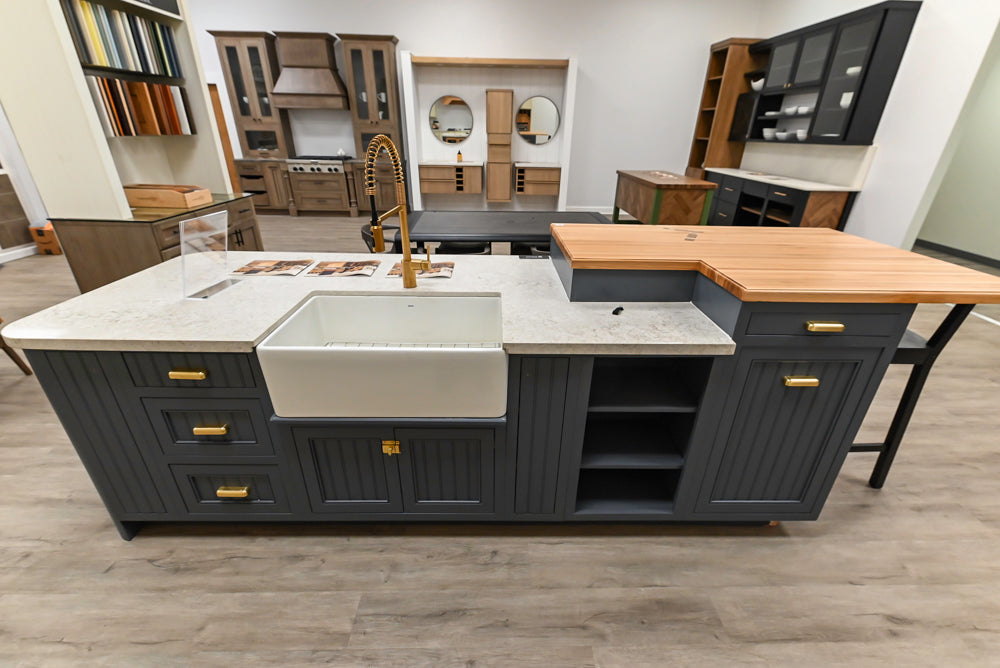 Covered Bridge Two-Tone Traditional Showroom Kitchen with Island and Caesarstone Countertops