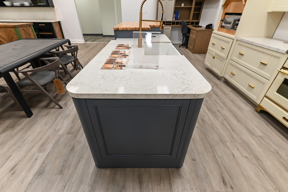 Covered Bridge Two-Tone Traditional Showroom Kitchen with Island and Caesarstone Countertops