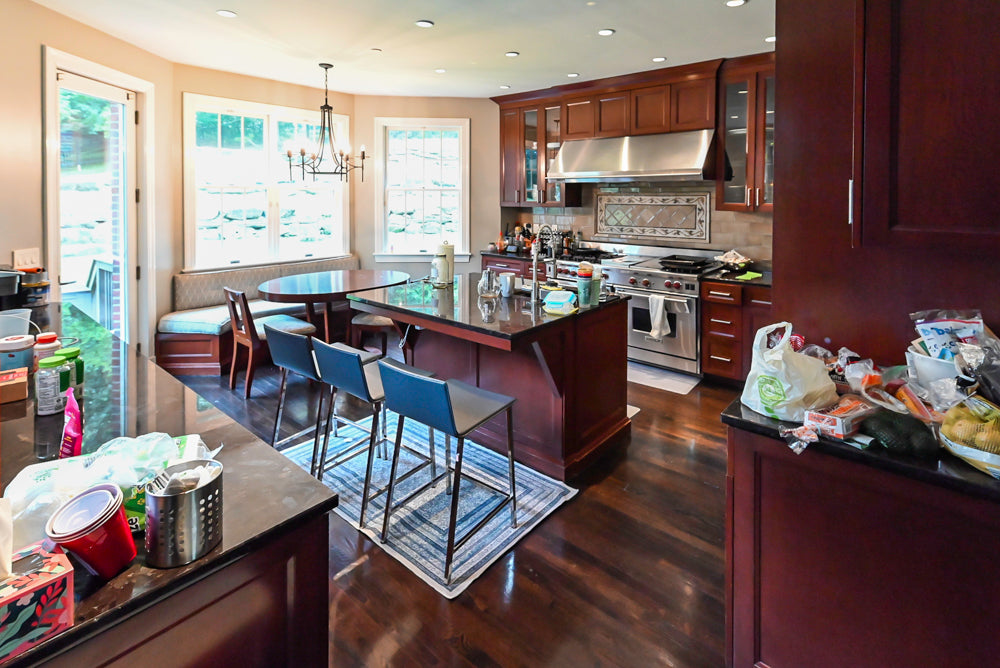 Stylish Dark Wooden Transitional Pre-Owned Kitchen with Appliances and Dark Granite Island