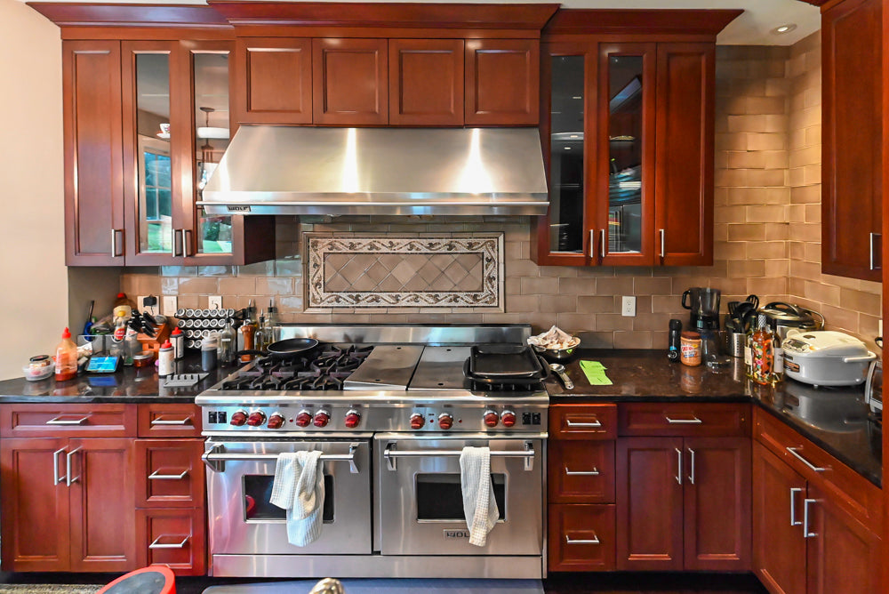 Stylish Dark Wooden Transitional Pre-Owned Kitchen with Appliances and Dark Granite Island