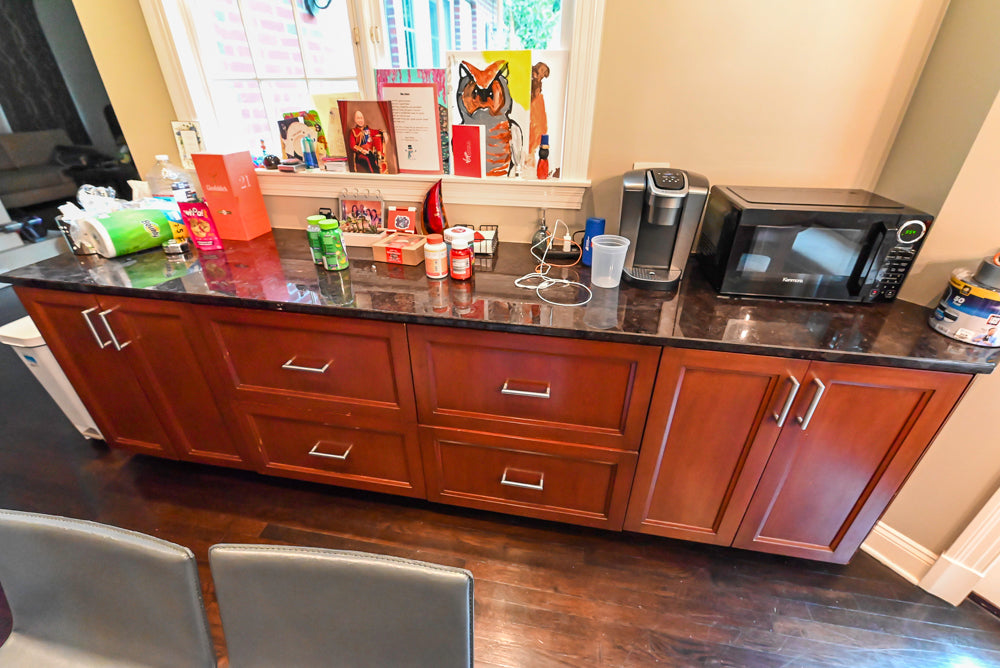 Stylish Dark Wooden Transitional Pre-Owned Kitchen with Appliances and Dark Granite Island