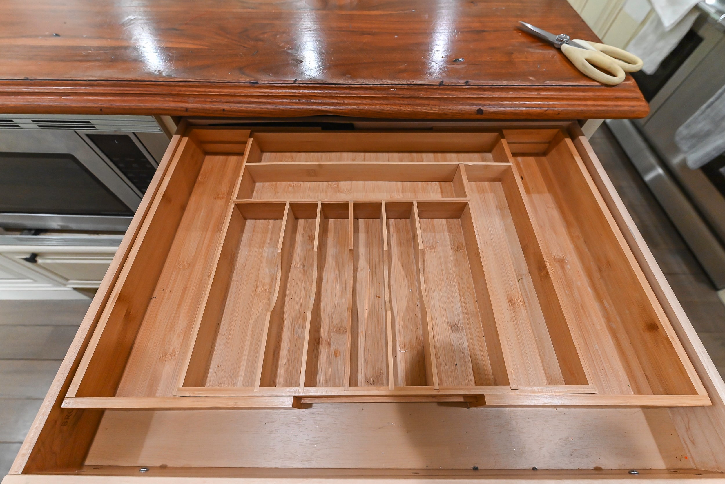 Brookhaven Beauty: Traditional Cream Kitchen with Island & Appliances