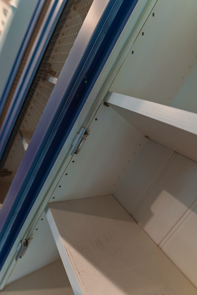 Traditional White Kitchen with Blue Island & Appliances