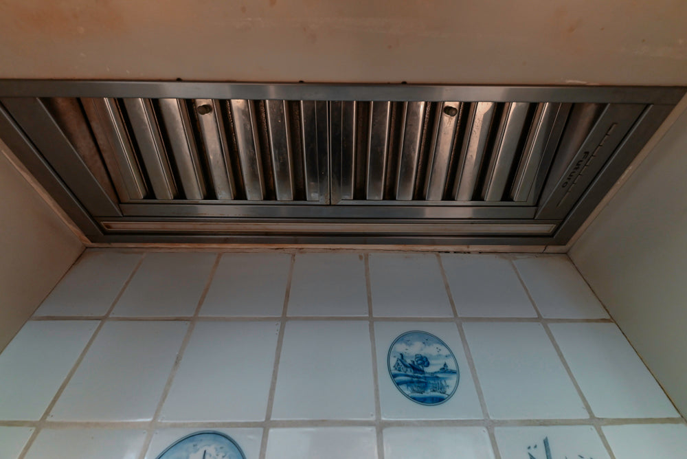 Traditional White Kitchen with Blue Island & Appliances