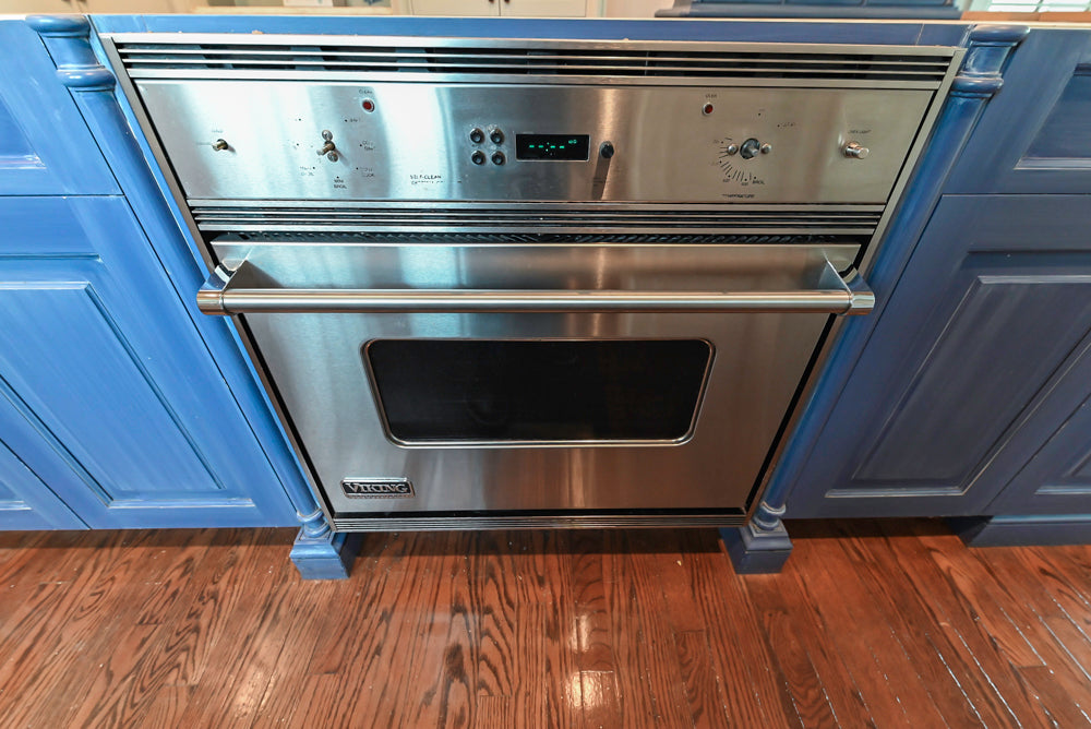 Traditional White Kitchen with Blue Island & Appliances