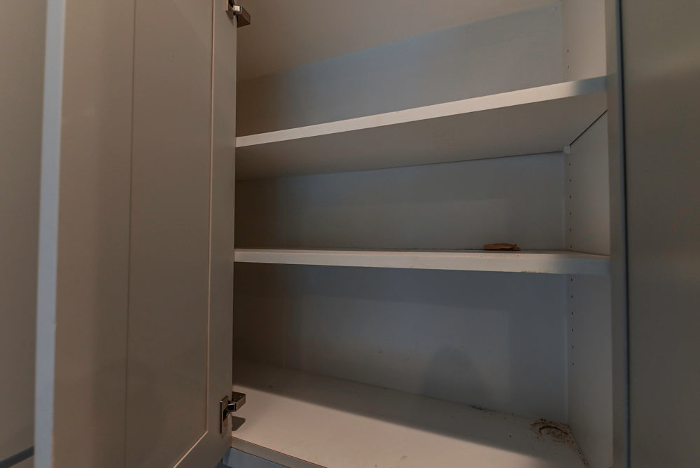 Traditional White Kitchen with Blue Island & Appliances